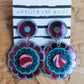 Dakota Rae Dust Earrings: Irridescent Flower & Blue Glitter